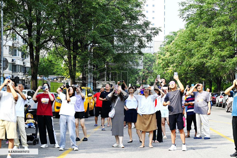 Citizens Watch Military Parade Aircraft in Beijing