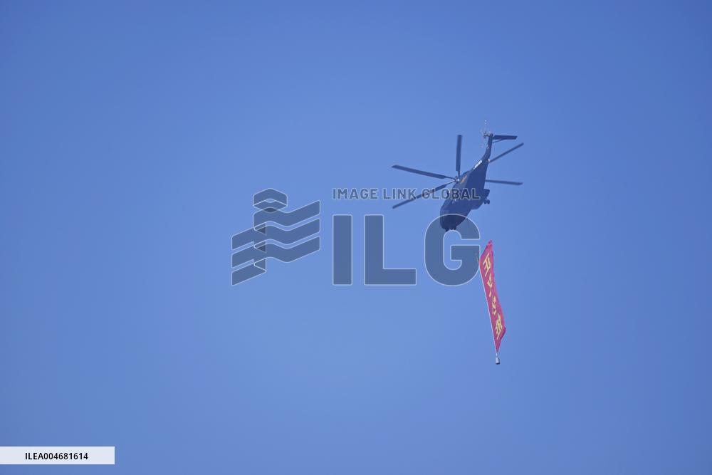 Citizens Watch Military Parade Aircraft in Beijing