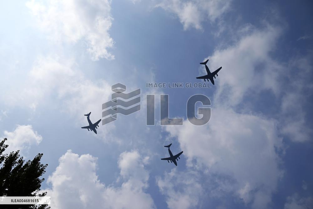 Citizens Watch Military Parade Aircraft in Beijing