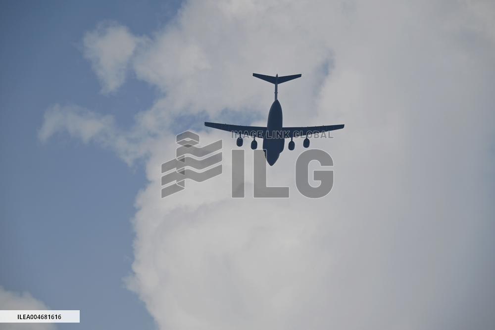Citizens Watch Military Parade Aircraft in Beijing