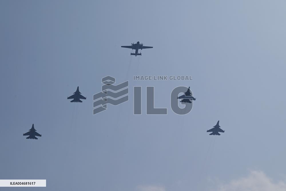 Citizens Watch Military Parade Aircraft in Beijing