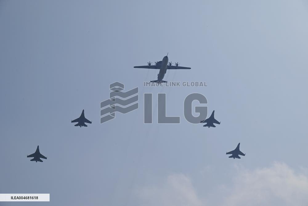 Citizens Watch Military Parade Aircraft in Beijing