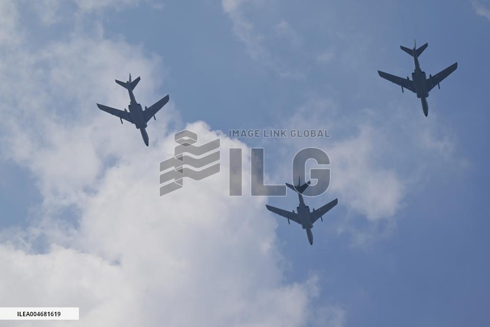 Citizens Watch Military Parade Aircraft in Beijing