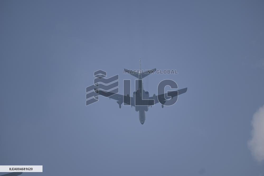 Citizens Watch Military Parade Aircraft in Beijing