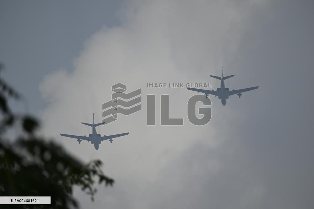 Citizens Watch Military Parade Aircraft in Beijing