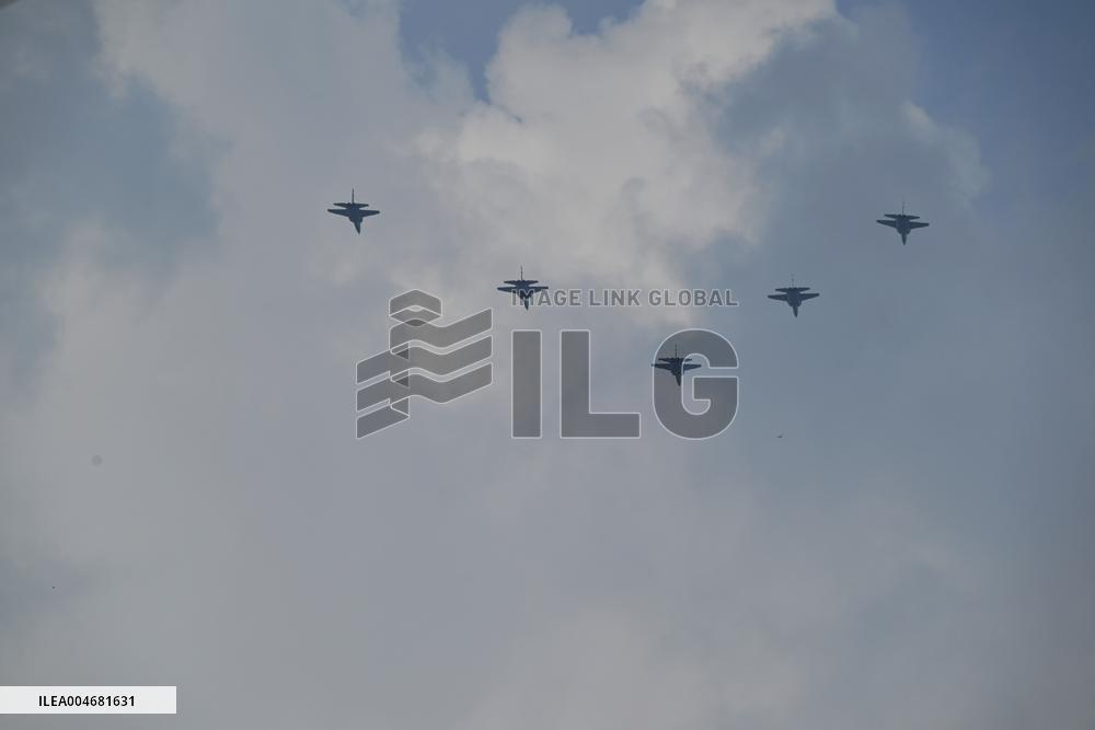 Citizens Watch Military Parade Aircraft in Beijing