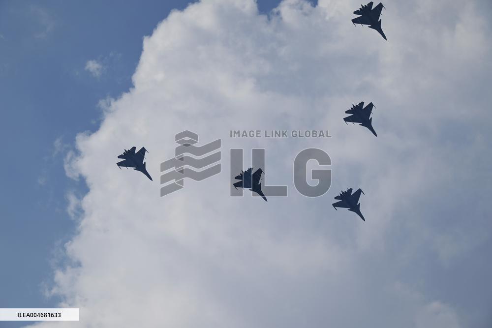 Citizens Watch Military Parade Aircraft in Beijing