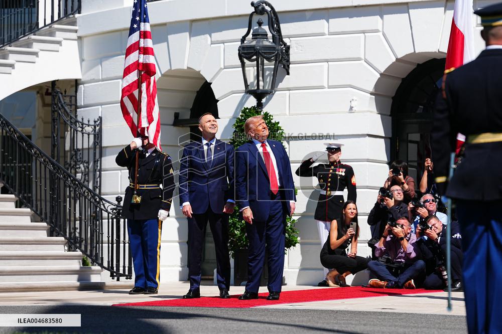 Trump greets President Karol Nawrocki of Poland on the South Portico of the White House