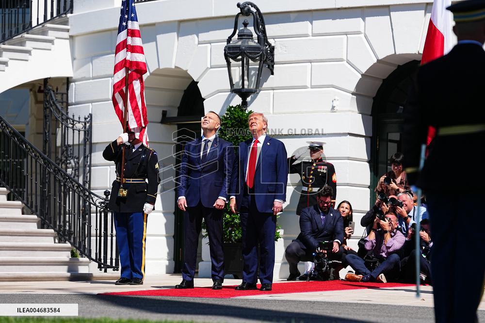 Trump greets President Karol Nawrocki of Poland on the South Portico of the White House
