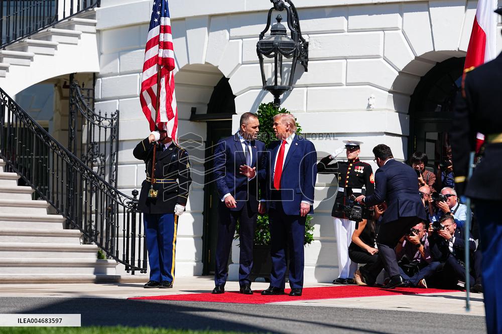 Trump greets President Karol Nawrocki of Poland on the South Portico of the White House
