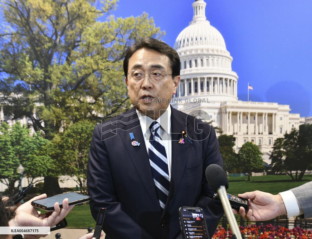 Japan economic revitalization minister in Washington