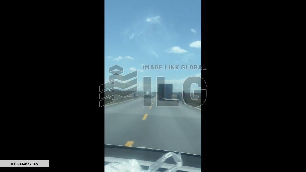 China: Sheep Hilariously Make Jump While Crossing Road in Qinghai