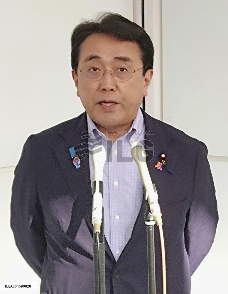 Japan economic revitalization minister returns home