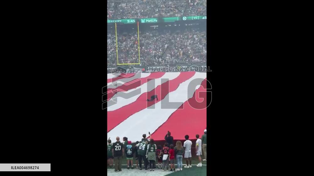US: Fan Gets Stuck on American Flag at Jets-Steelers Game at MetLife Stadium
