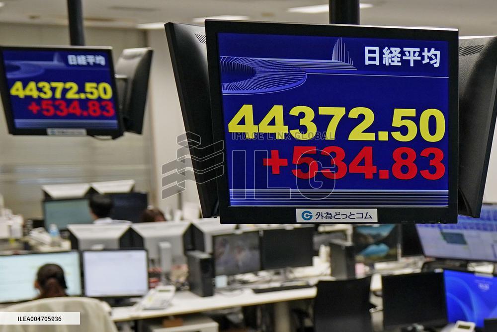 Nikkei stock index ends at record high