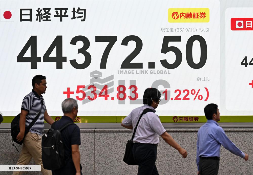 Nikkei stock index ends at record high