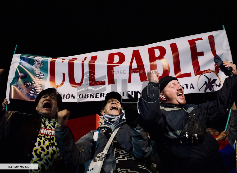 Supporters Hold Masks of Former President Alvaro Uribe During Trial in Bogota