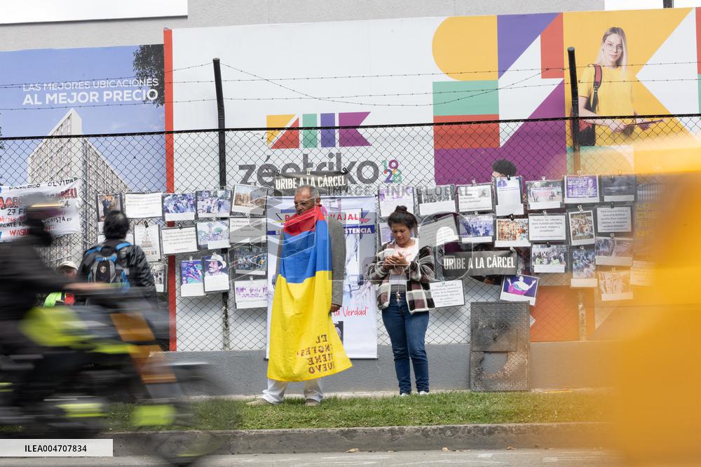 Supporters Hold Masks of Former President Alvaro Uribe During Trial in Bogota