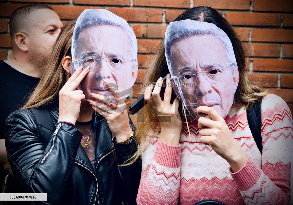 Supporters Hold Masks of Former President Alvaro Uribe During Trial in Bogota