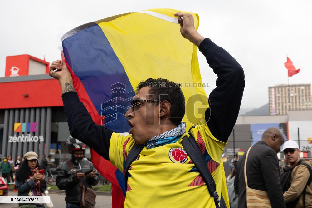 Supporters Hold Masks of Former President Alvaro Uribe During Trial in Bogota
