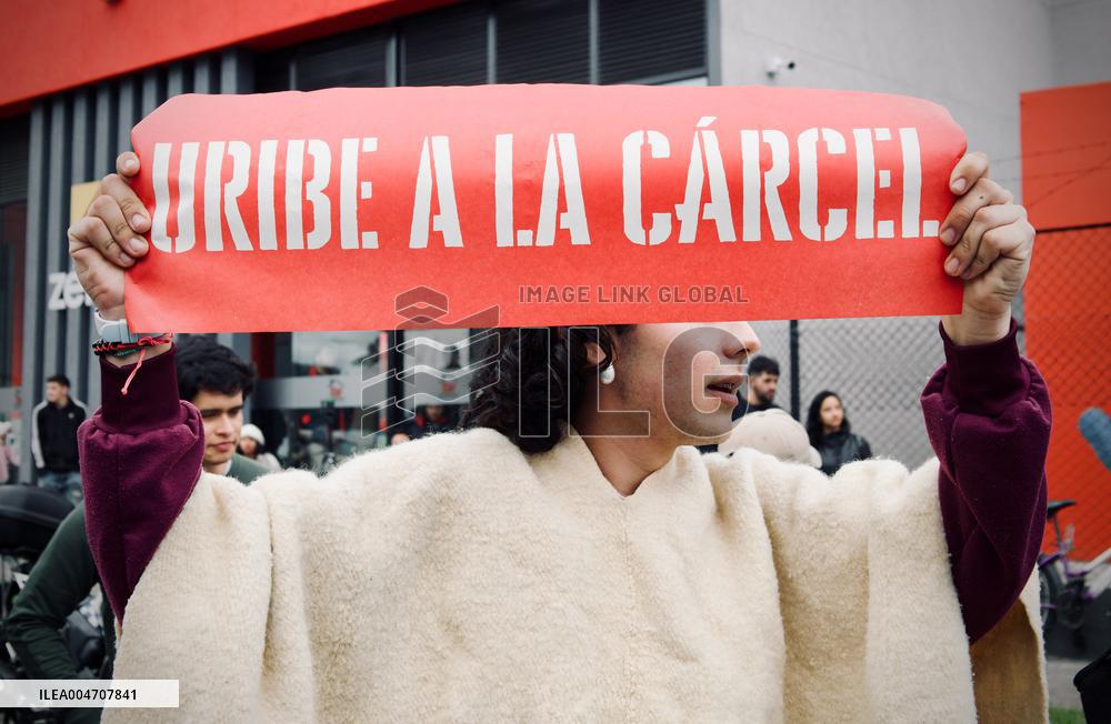 Supporters Hold Masks of Former President Alvaro Uribe During Trial in Bogota