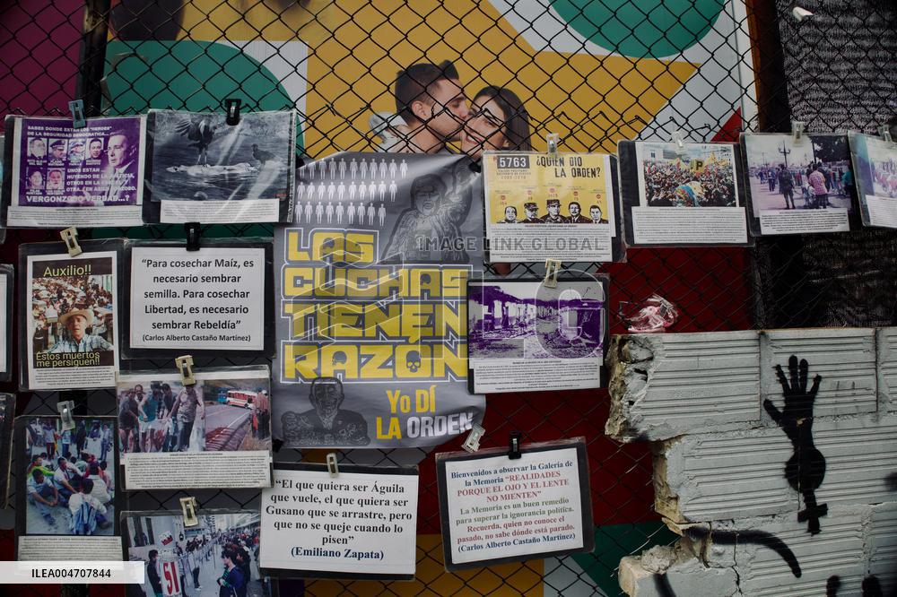 Supporters Hold Masks of Former President Alvaro Uribe During Trial in Bogota