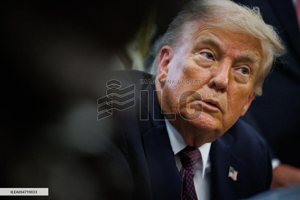 DC: President Trump Signs a Presidential Memorandum in Oval Office