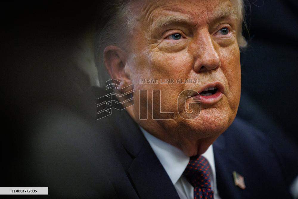 DC: President Trump Signs a Presidential Memorandum in Oval Office