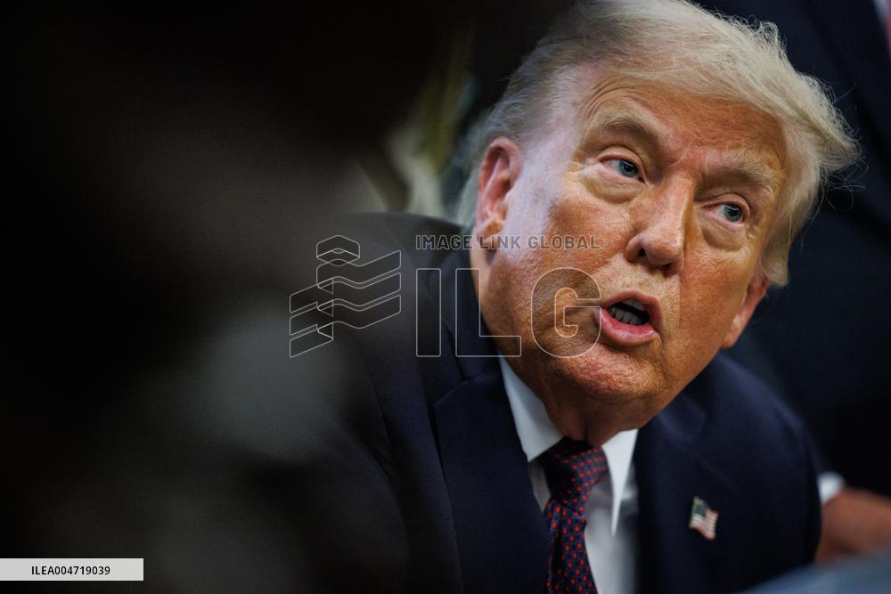 DC: President Trump Signs a Presidential Memorandum in Oval Office