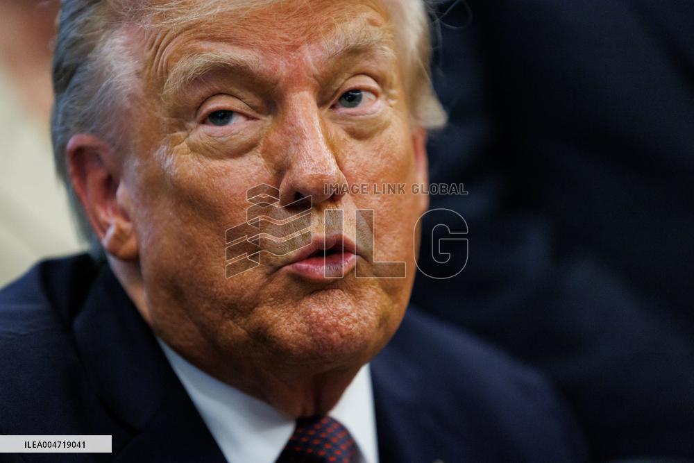 DC: President Trump Signs a Presidential Memorandum in Oval Office