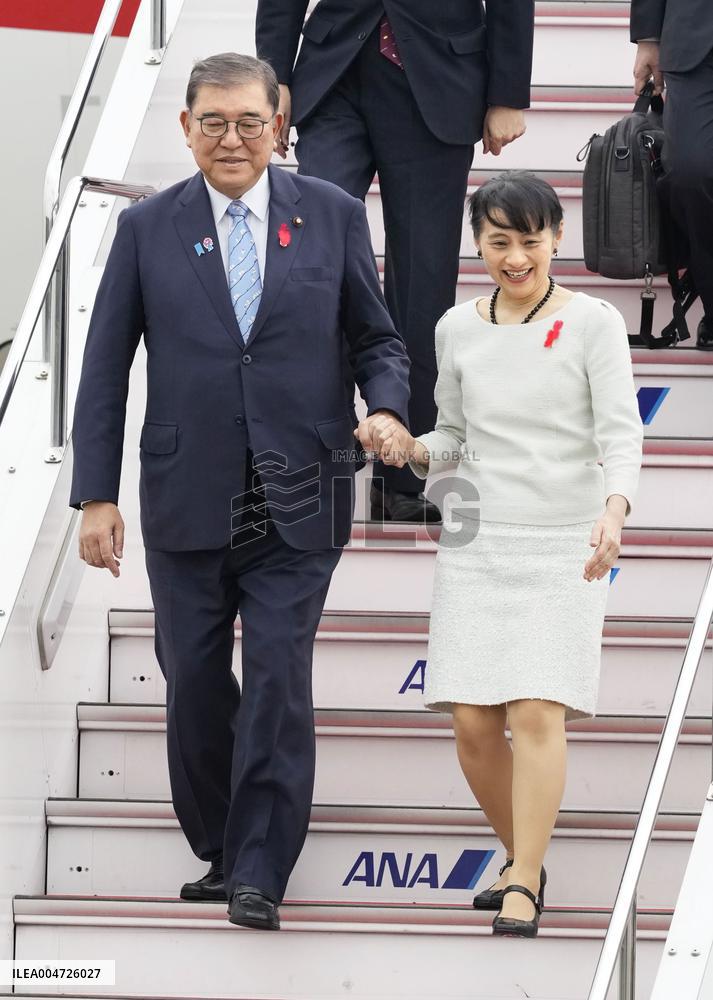 Japan PM Ishiba returns home