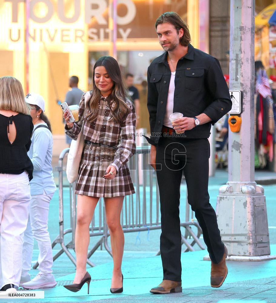 Miranda Cosgrove and Pierson Fode out in Times Square - New York