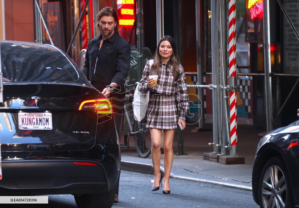Miranda Cosgrove and Pierson Fode out in Times Square - New York