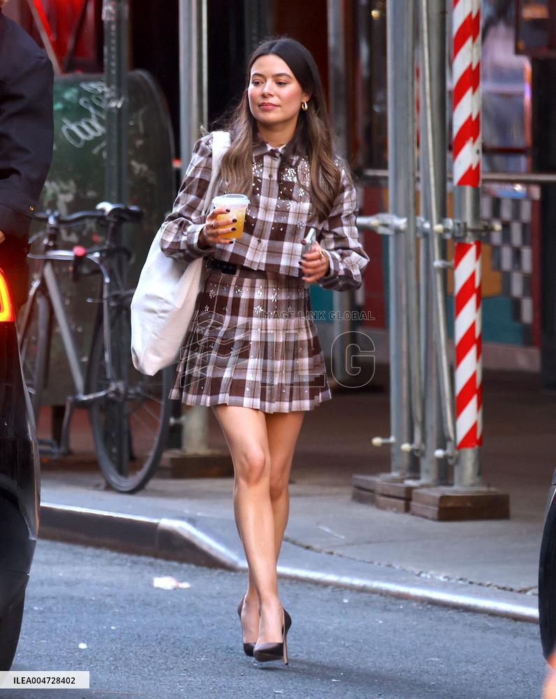 Miranda Cosgrove and Pierson Fode out in Times Square - New York