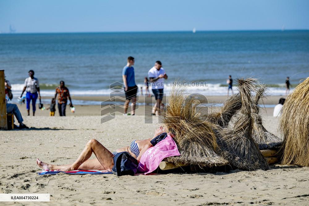 Beachgoers Enjoy Late Summer Warm Weather - Netherlands