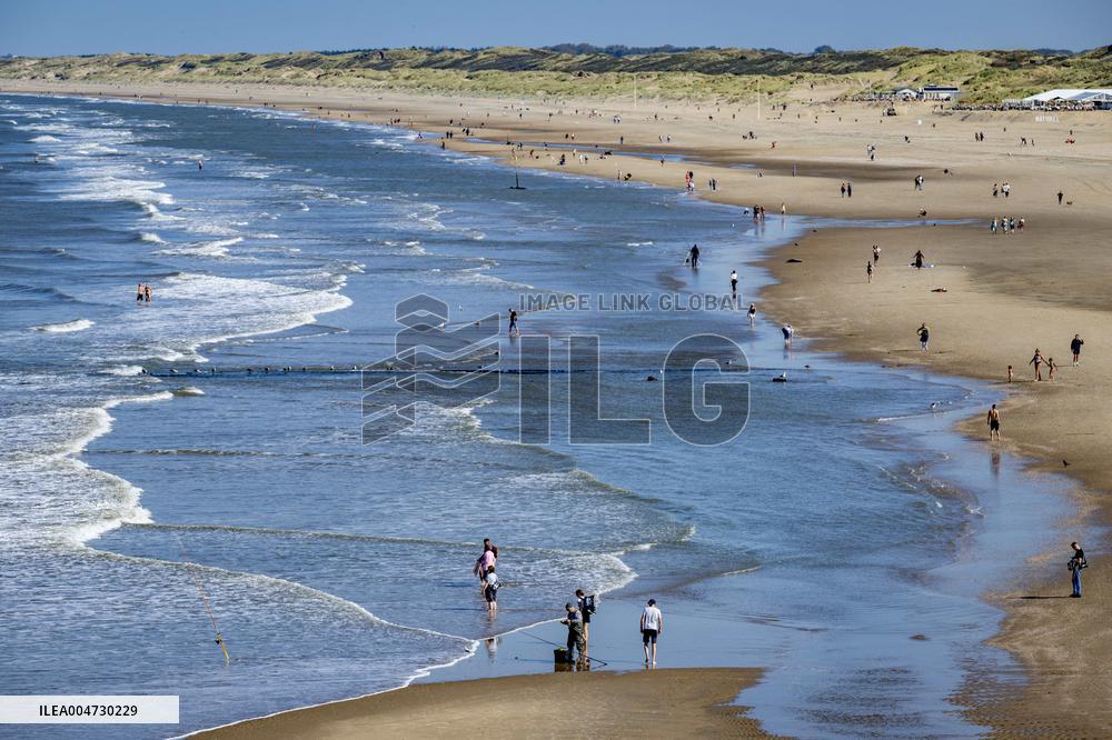 Beachgoers Enjoy Late Summer Warm Weather - Netherlands