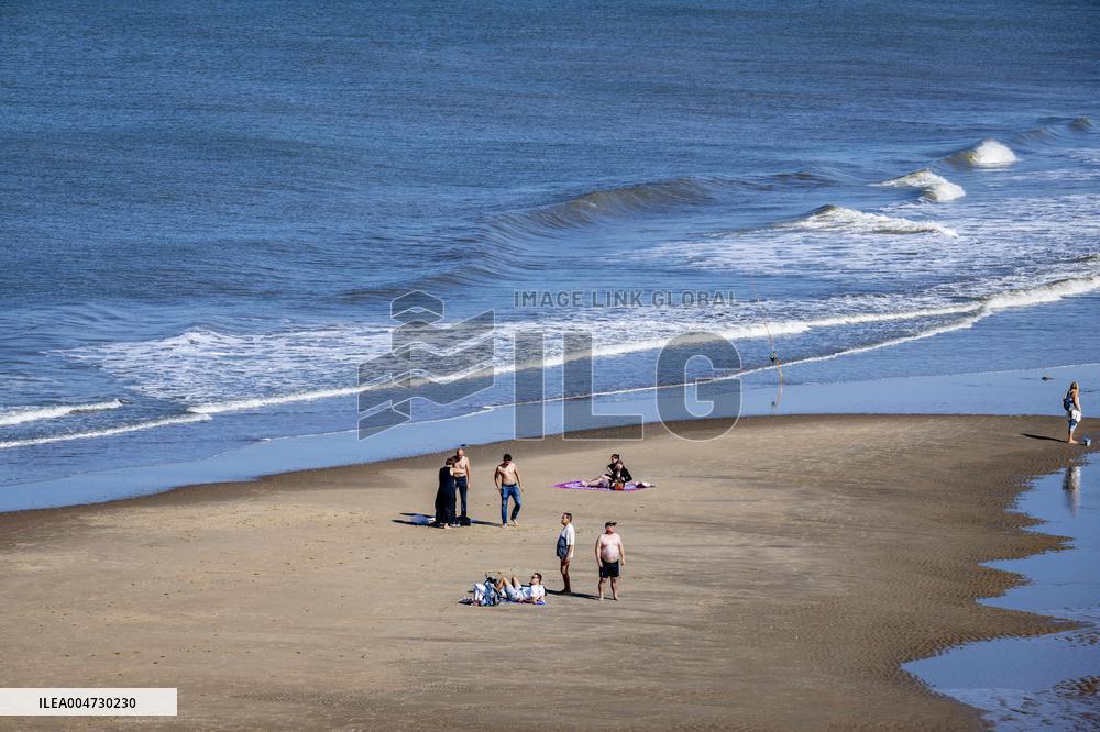 Beachgoers Enjoy Late Summer Warm Weather - Netherlands
