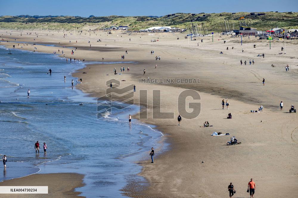Beachgoers Enjoy Late Summer Warm Weather - Netherlands