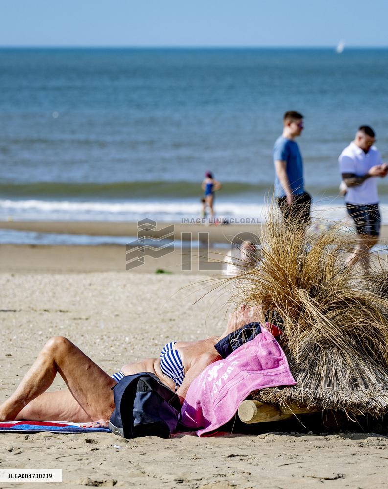 Beachgoers Enjoy Late Summer Warm Weather - Netherlands