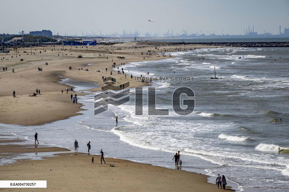 Beachgoers Enjoy Late Summer Warm Weather - Netherlands