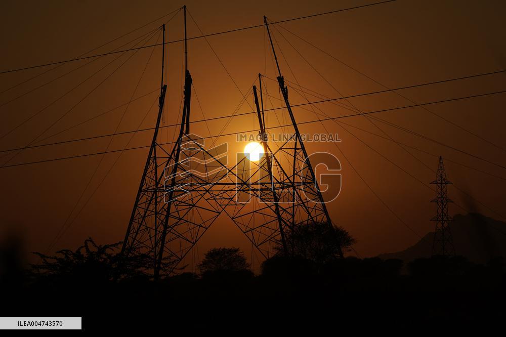 Workers Are Installing a High-Voltage Electricity Pylon - India