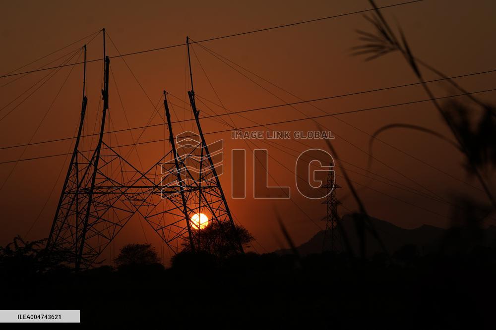 Workers Are Installing a High-Voltage Electricity Pylon - India