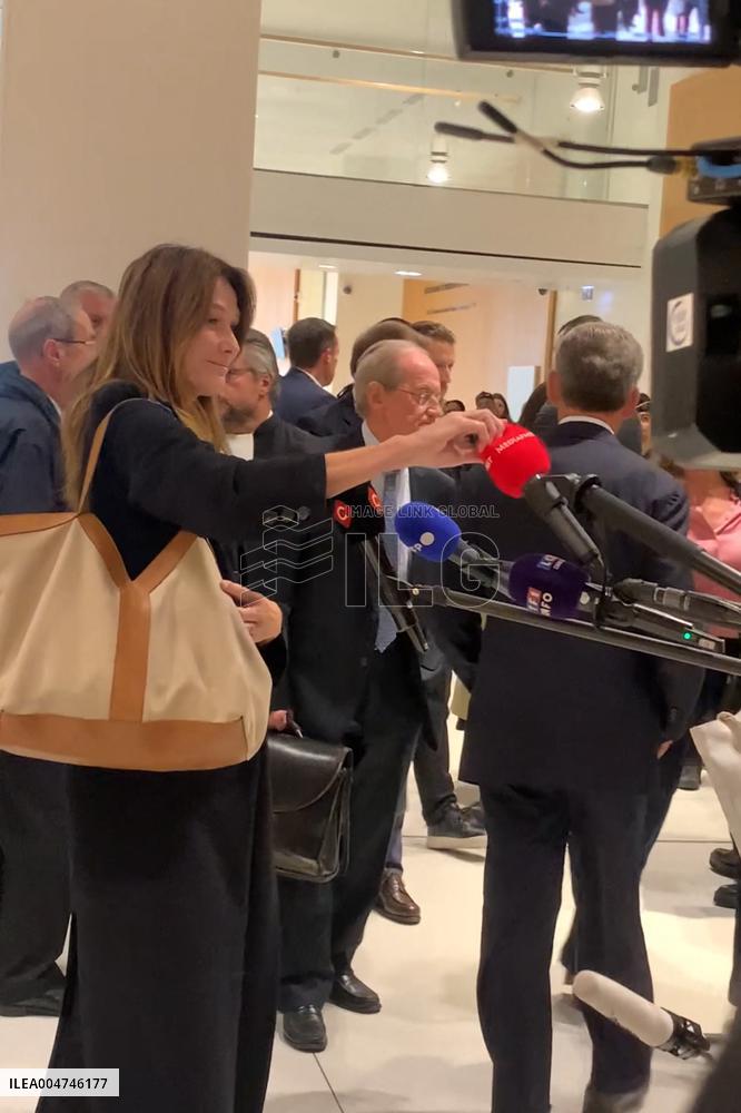 Carla Bruni Grabs The Windscreen Of A Mediapart Microphone