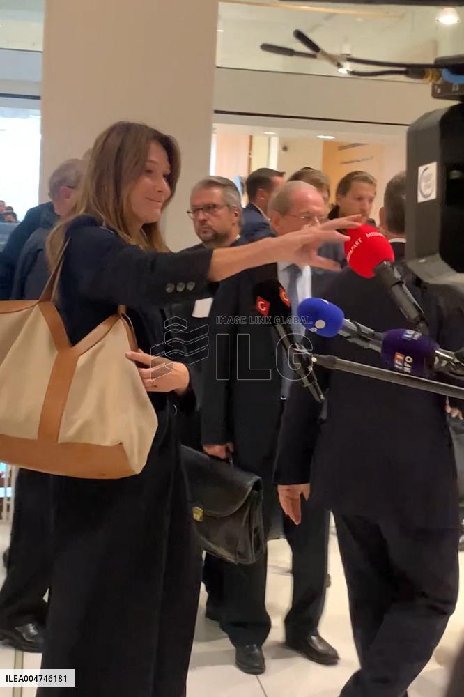 Carla Bruni Grabs The Windscreen Of A Mediapart Microphone