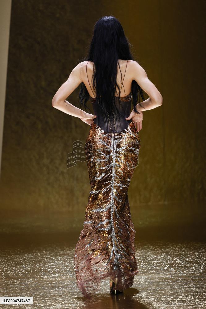 MFW Amelia Gray Hamlin walks the runway at the Roberto Cavalli MP