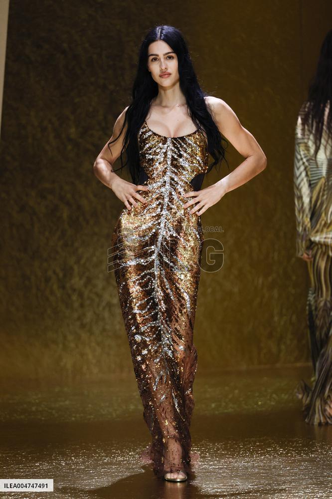 MFW Amelia Gray Hamlin walks the runway at the Roberto Cavalli MP