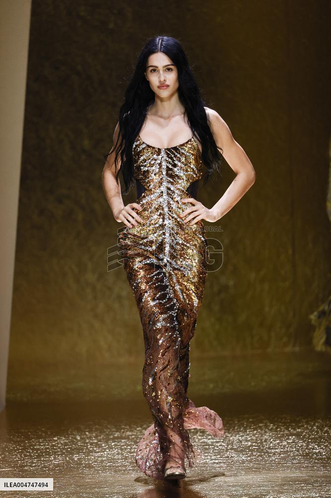 MFW Amelia Gray Hamlin walks the runway at the Roberto Cavalli MP