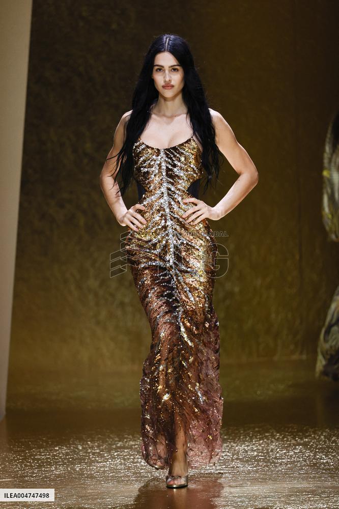 MFW Amelia Gray Hamlin walks the runway at the Roberto Cavalli MP