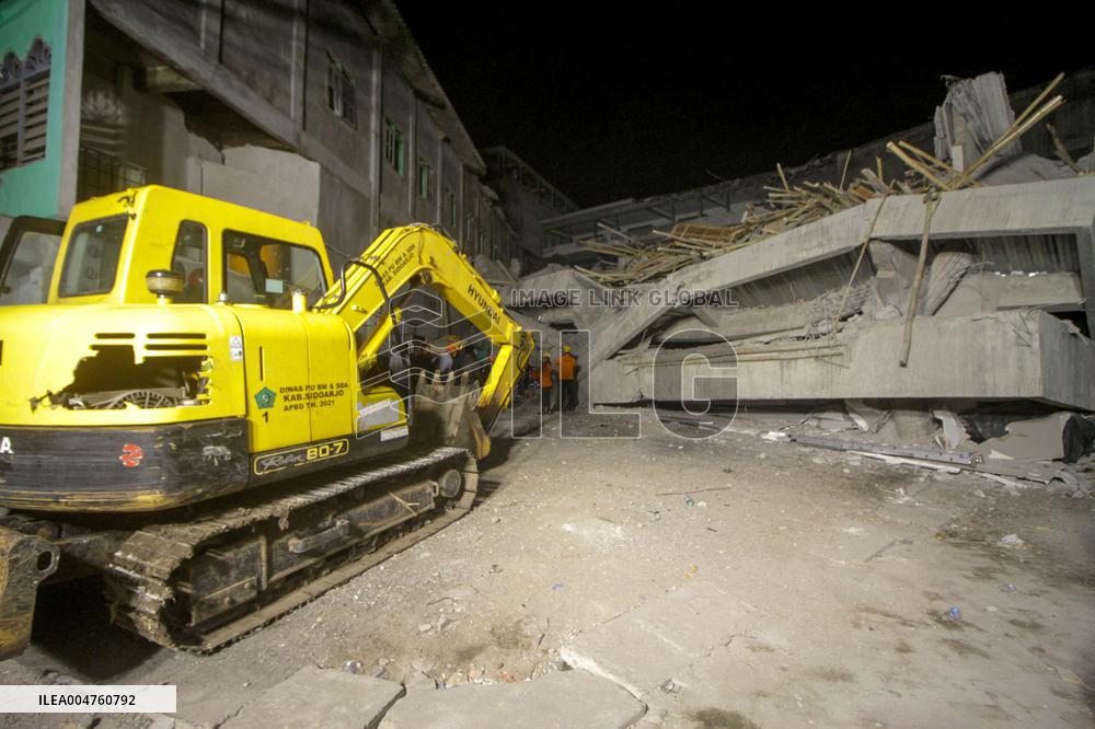 School Collapse Leaves One Student Dead, 38 Missing - Indonesia