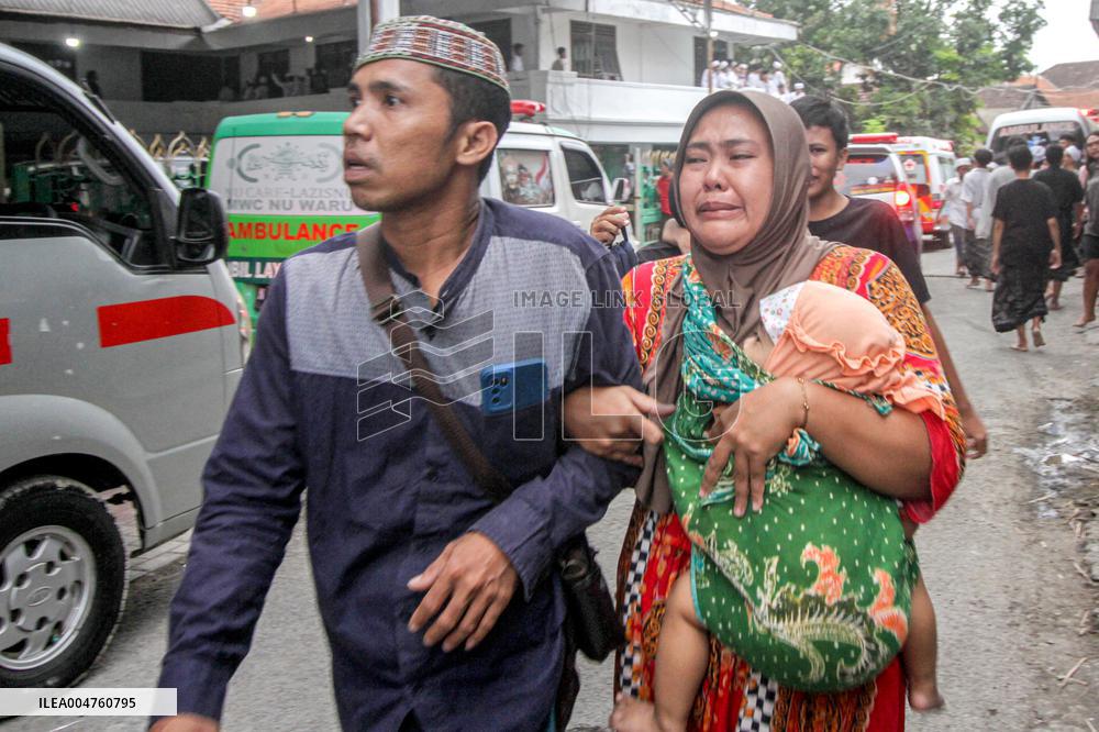 School Collapse Leaves One Student Dead, 38 Missing - Indonesia